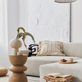 Living room interior with neutral sofa