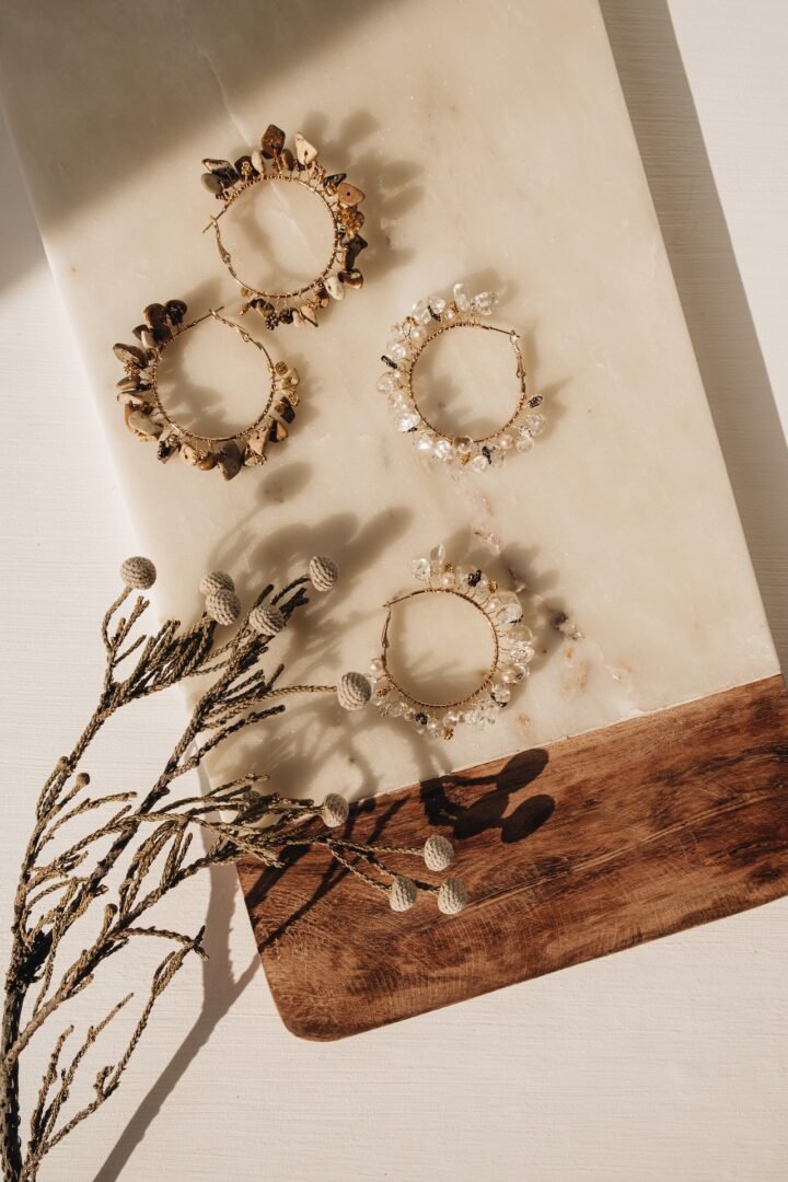 trendy-handmade-earrings-floral-branch-marble-board-white